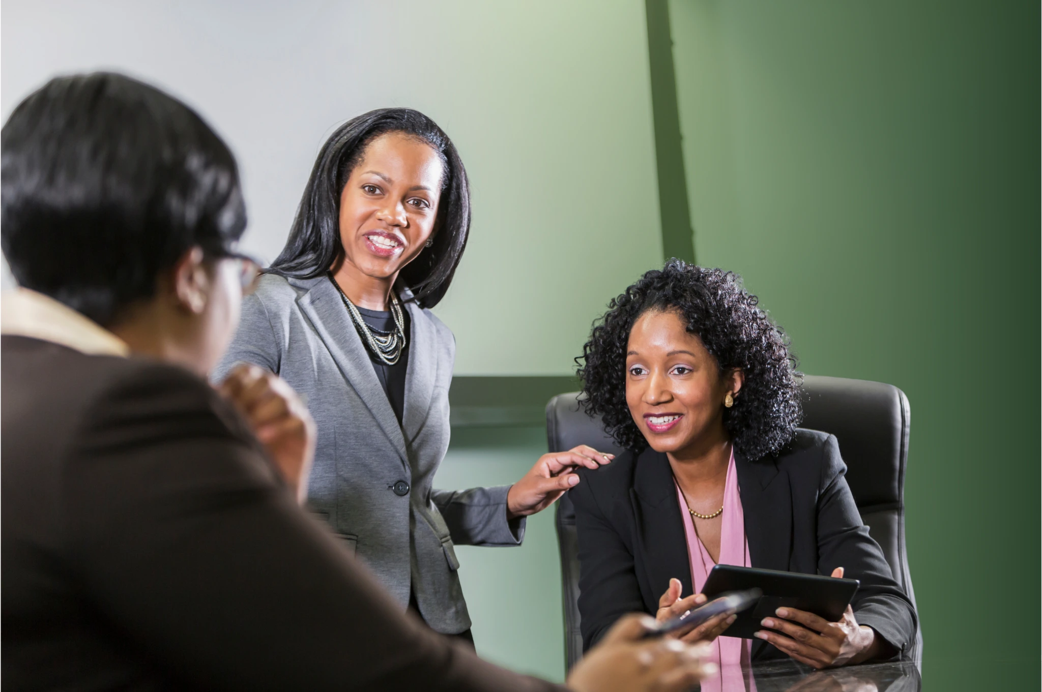 Team collaborating in an office to discuss IT solutions for organizations