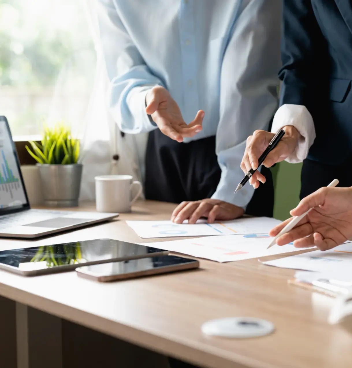 IT team meeting with a client to understand their needs and create custom technology solutions.